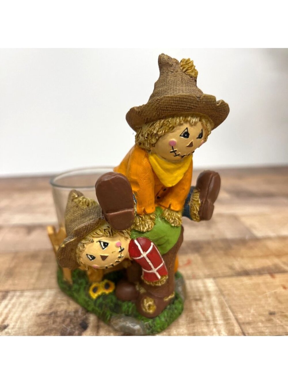 Scarecrow-Themed Resin Candle Holder With Pumpkin And Fence Design